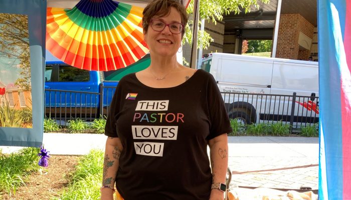Rev Jen Raffensperger wearing a shirt that says This Paster Loves You